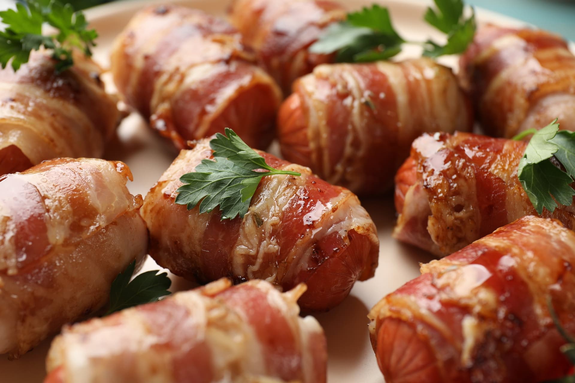 Pigs in blankets garnished with parsley
