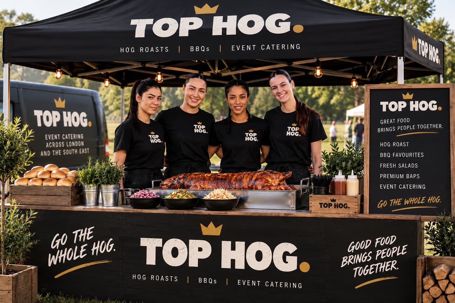 A Top Hog branded gazebo and serving counter at an outdoor event